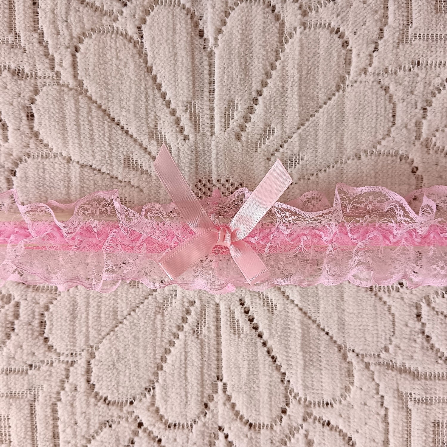 Dusty pink tie garter