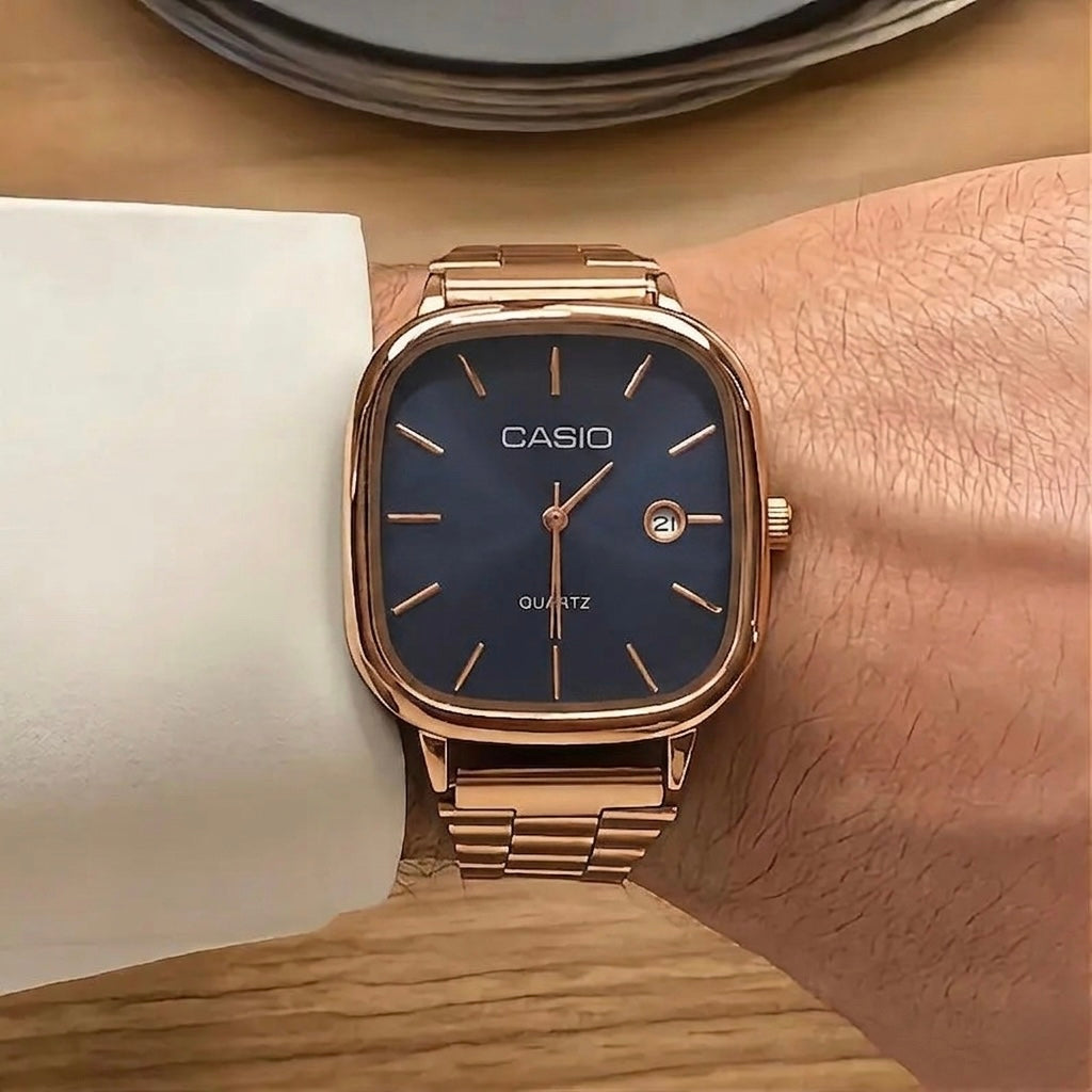 Rose gold Casio watch with Navy interior