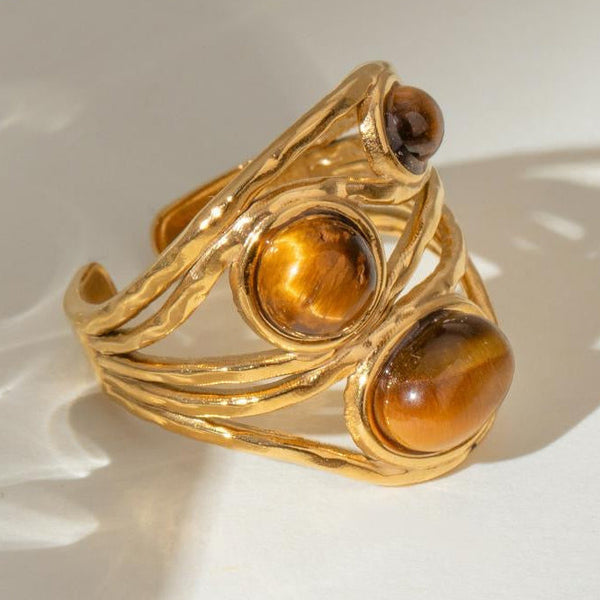 Three brown tiger’s eye ring