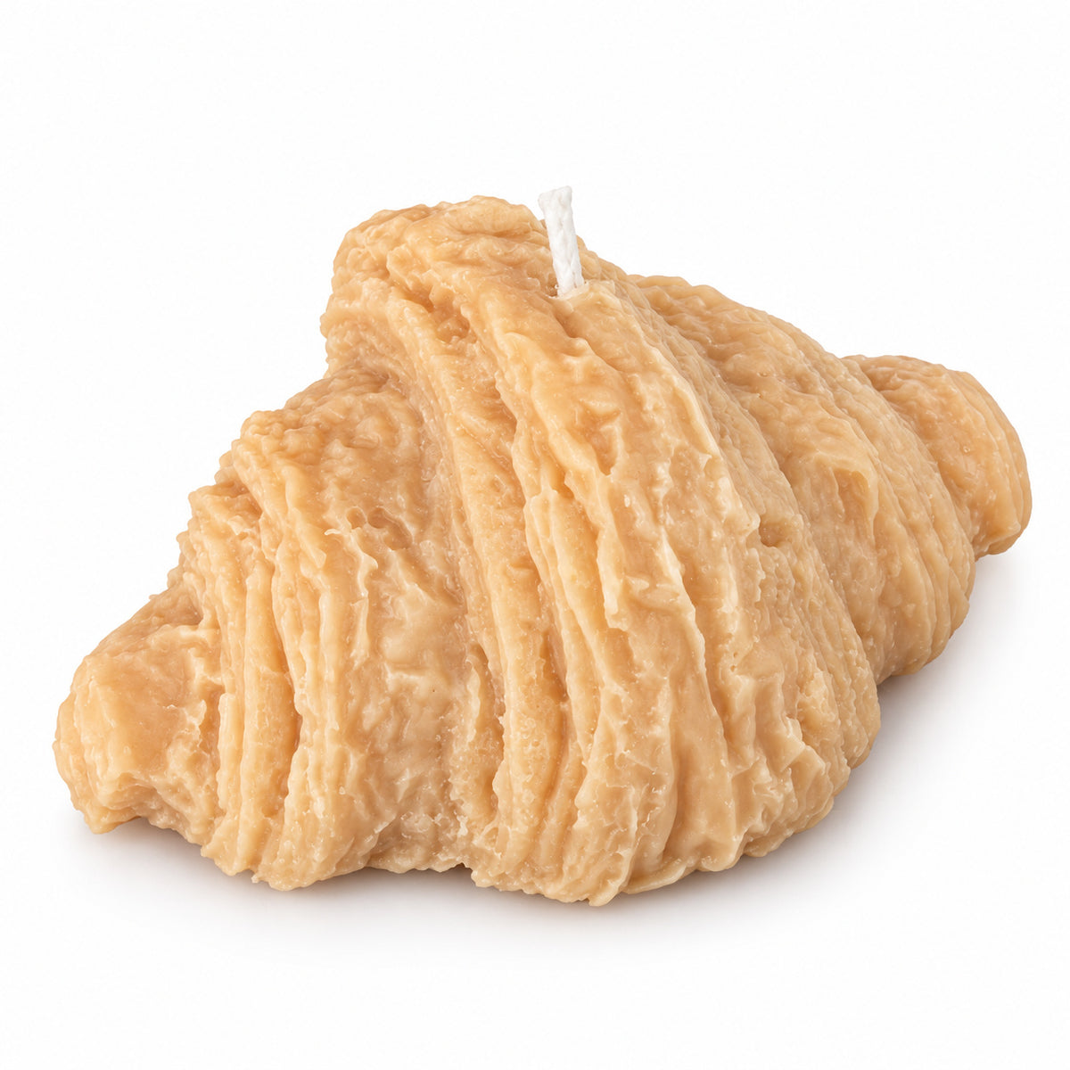 Croissant Candle – croissant-shaped wax candle with pastry-like ridges