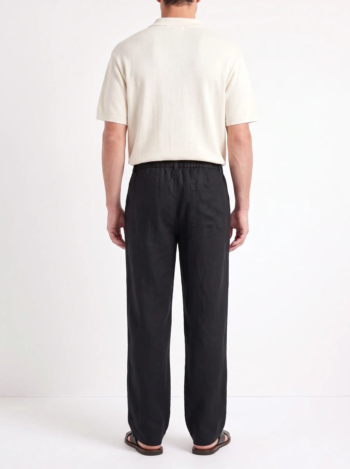 Heritage Linen Trouser — Black — worn by the model, back (relaxed fit)