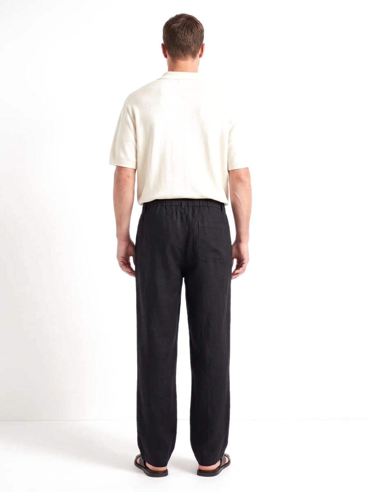 Heritage Linen Trouser — Black — worn by the model, back (relaxed fit)