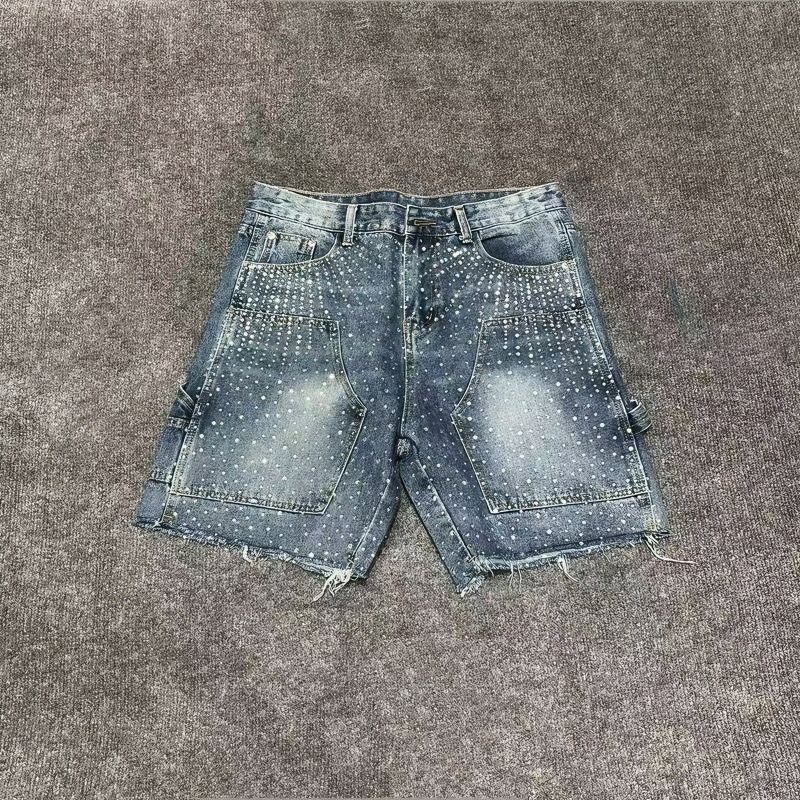 Blue rhinestone-studded denim shorts.