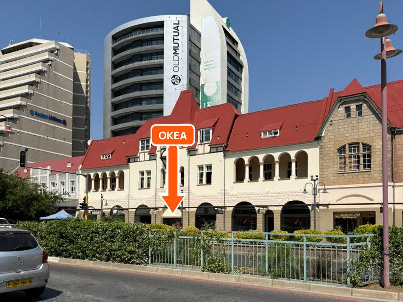The red-roofed buildings on Independence Avenue with the Old Mutual tower behind