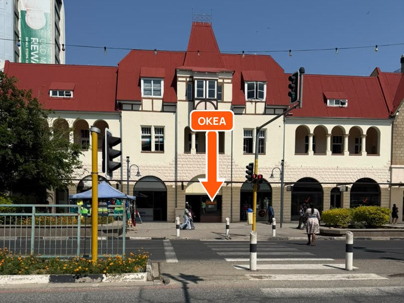 The pedestrian crossing in front of the building