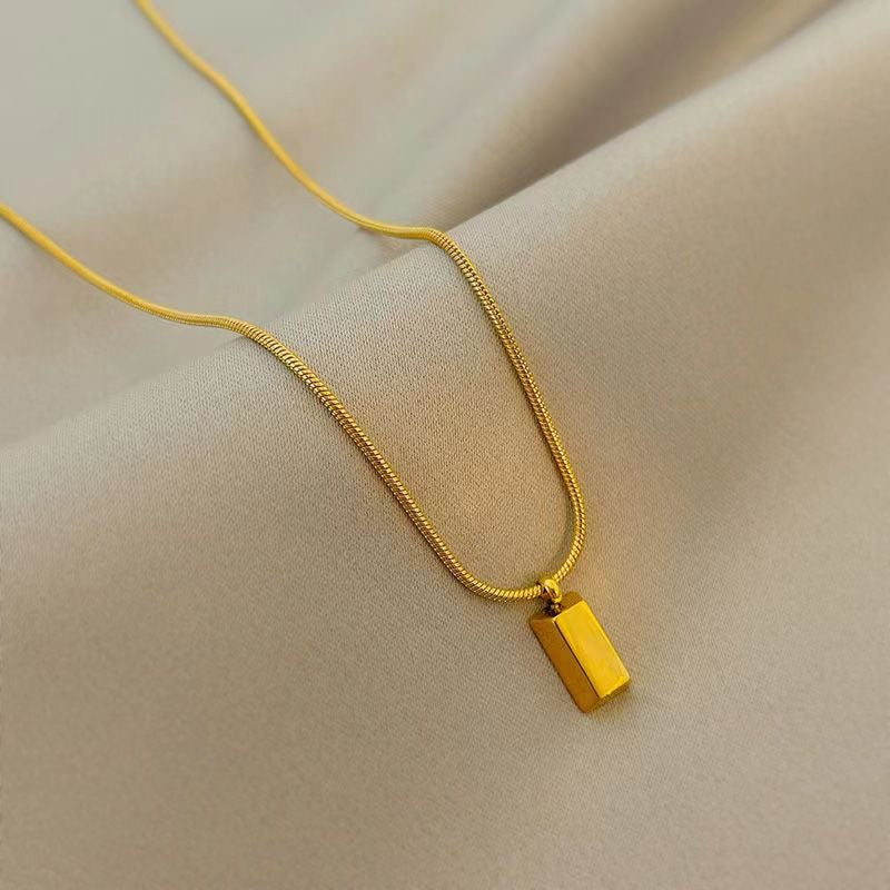 Gold brick necklace