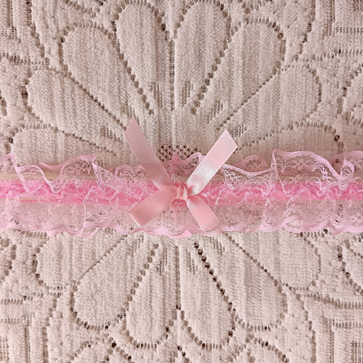 Dusty pink tie garter