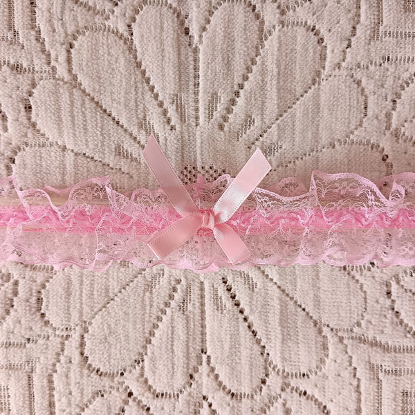Dusty pink tie garter