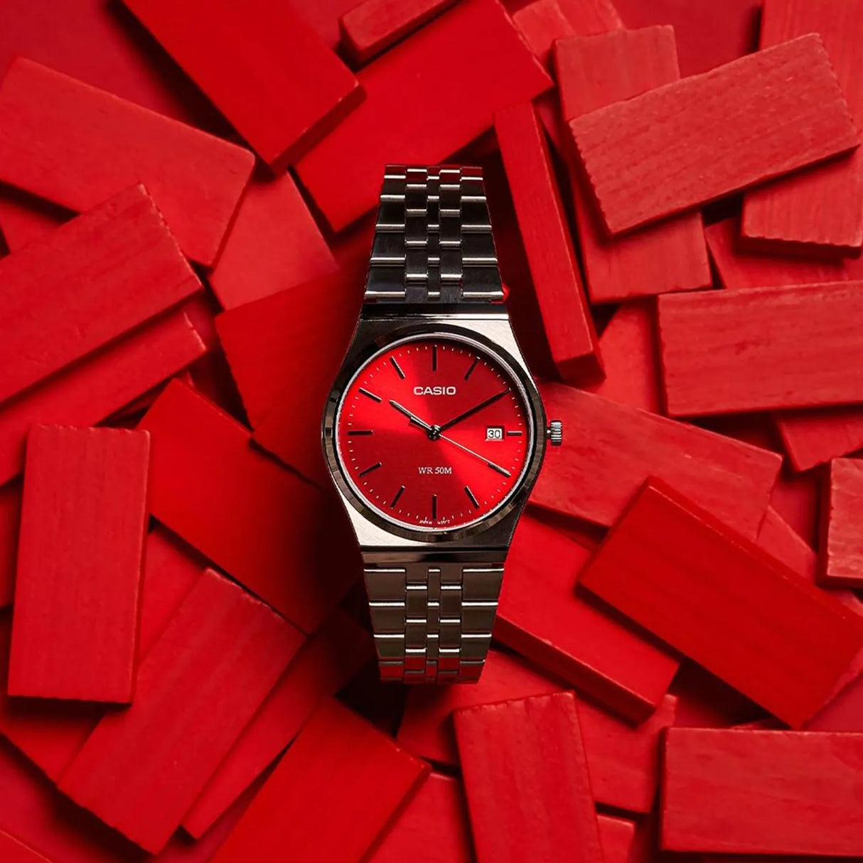 Silver casio red dial