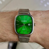 Green & Silver Casio watch