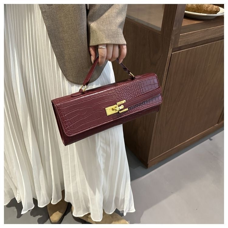 Minimalist crocodile handbag