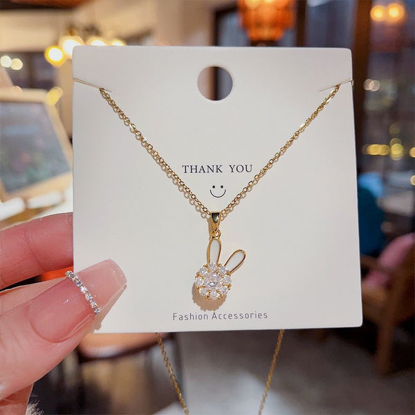 Spinning rabbit necklace