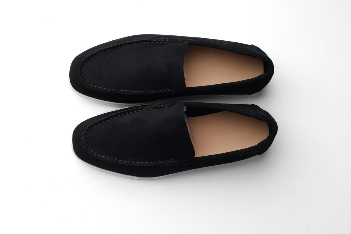 Belugga Terra Loafer in black suede on a beige sole, pair laid flat