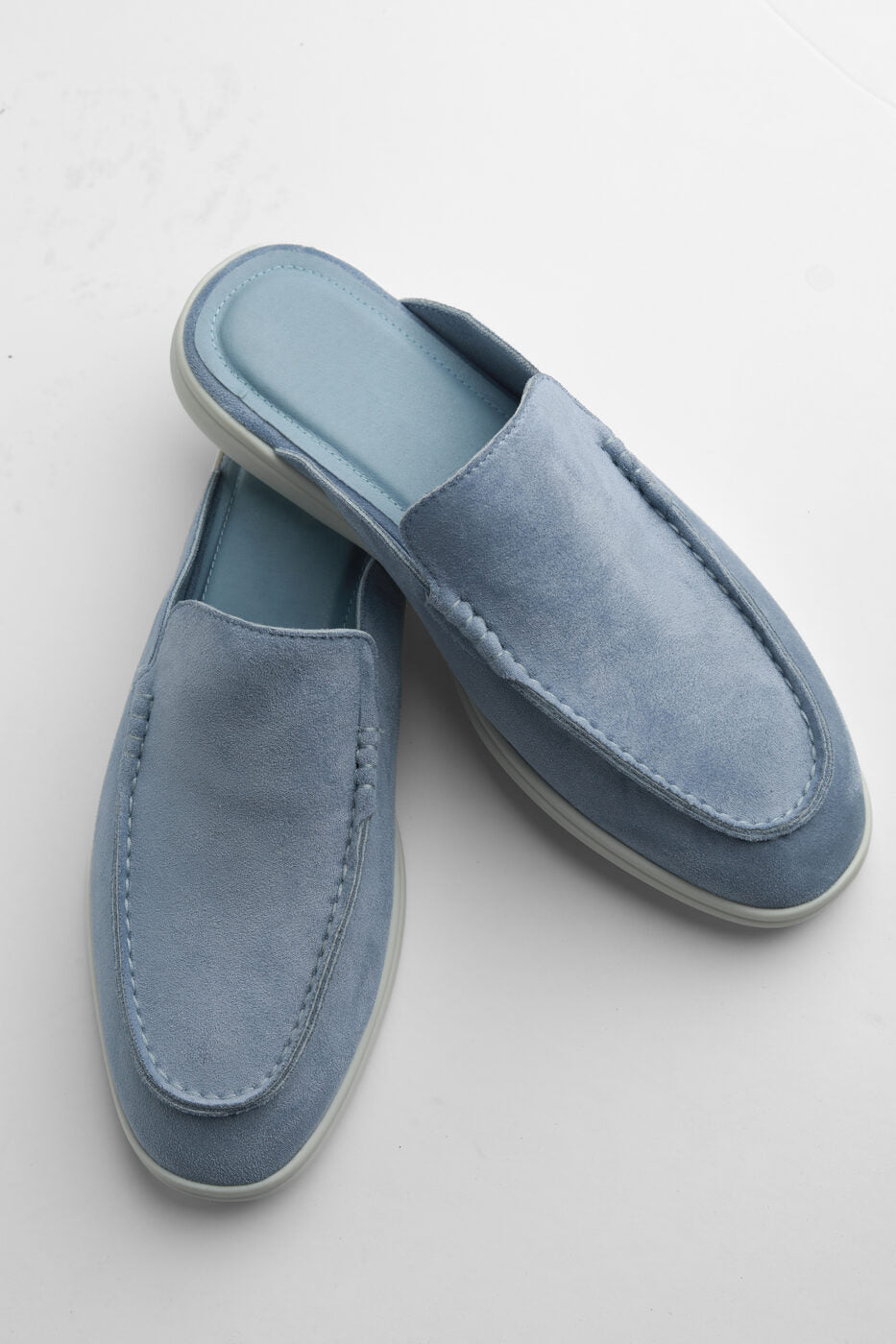 Belugga Dune Mule in dusk blue suede, pair viewed from above