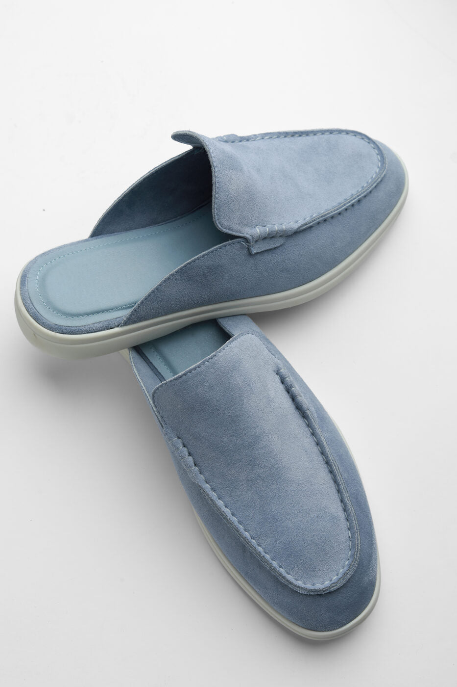 Belugga Dune Mule in dusk blue suede, side profile on white sole