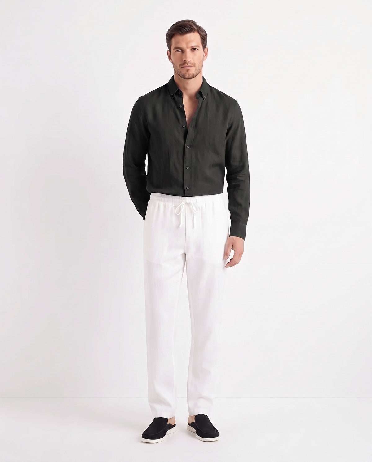 Linen Shirt — Black worn tucked in, with Linen Trouser, Drawstring — White and Dune Mule — Black