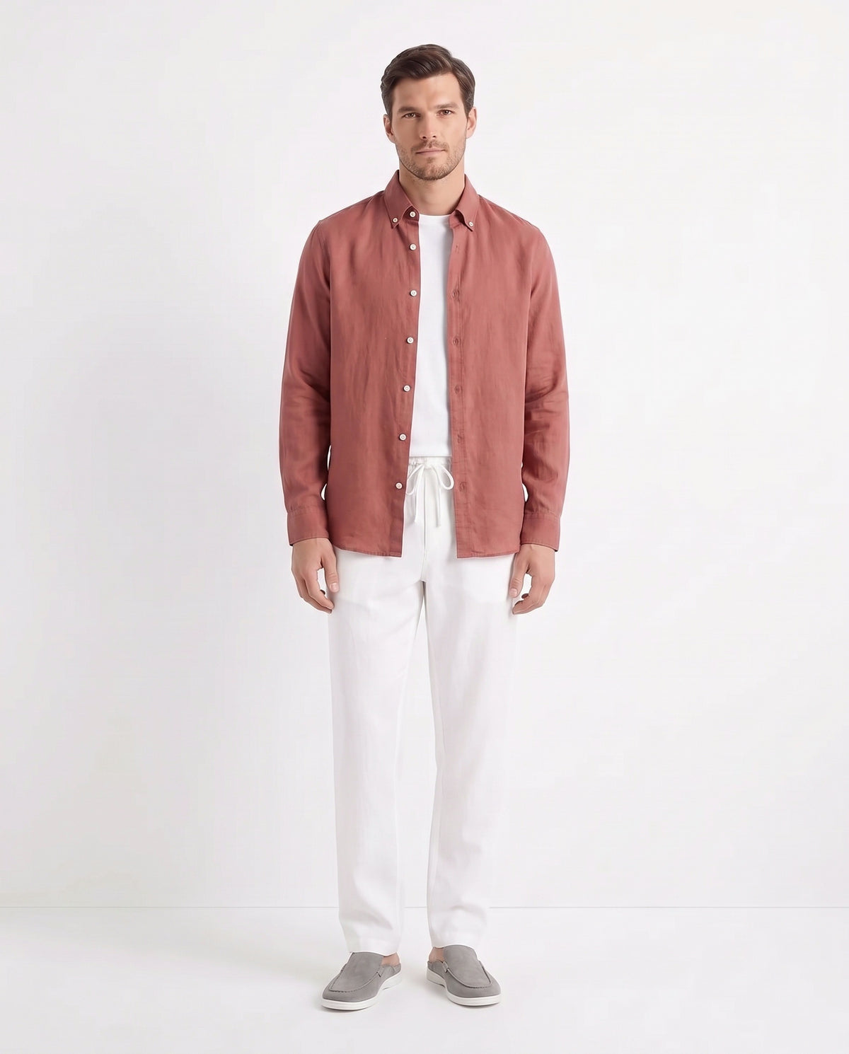 Linen Shirt — Brick Red worn open over a white tee, with Linen Trouser, Drawstring — White and Dune Mule — Grey
