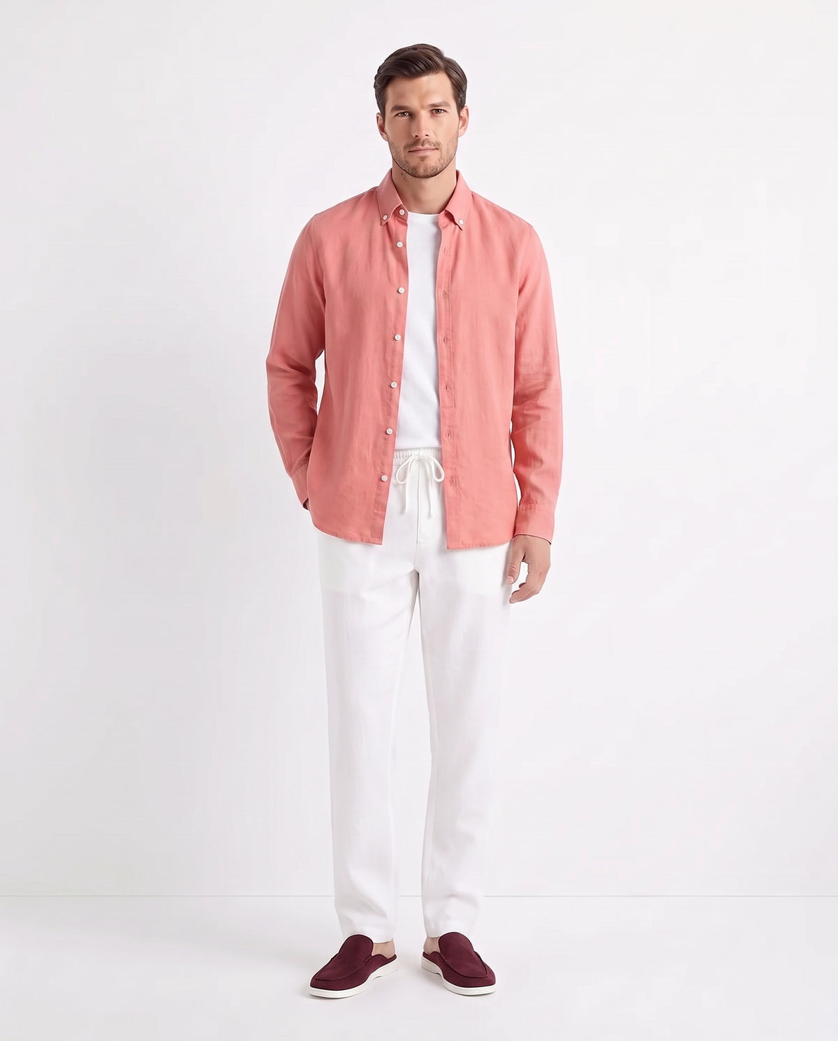 Linen Shirt — Coral Pink worn open over a white tee, with Linen Trouser, Drawstring — White and Dune Mule — Burgundy