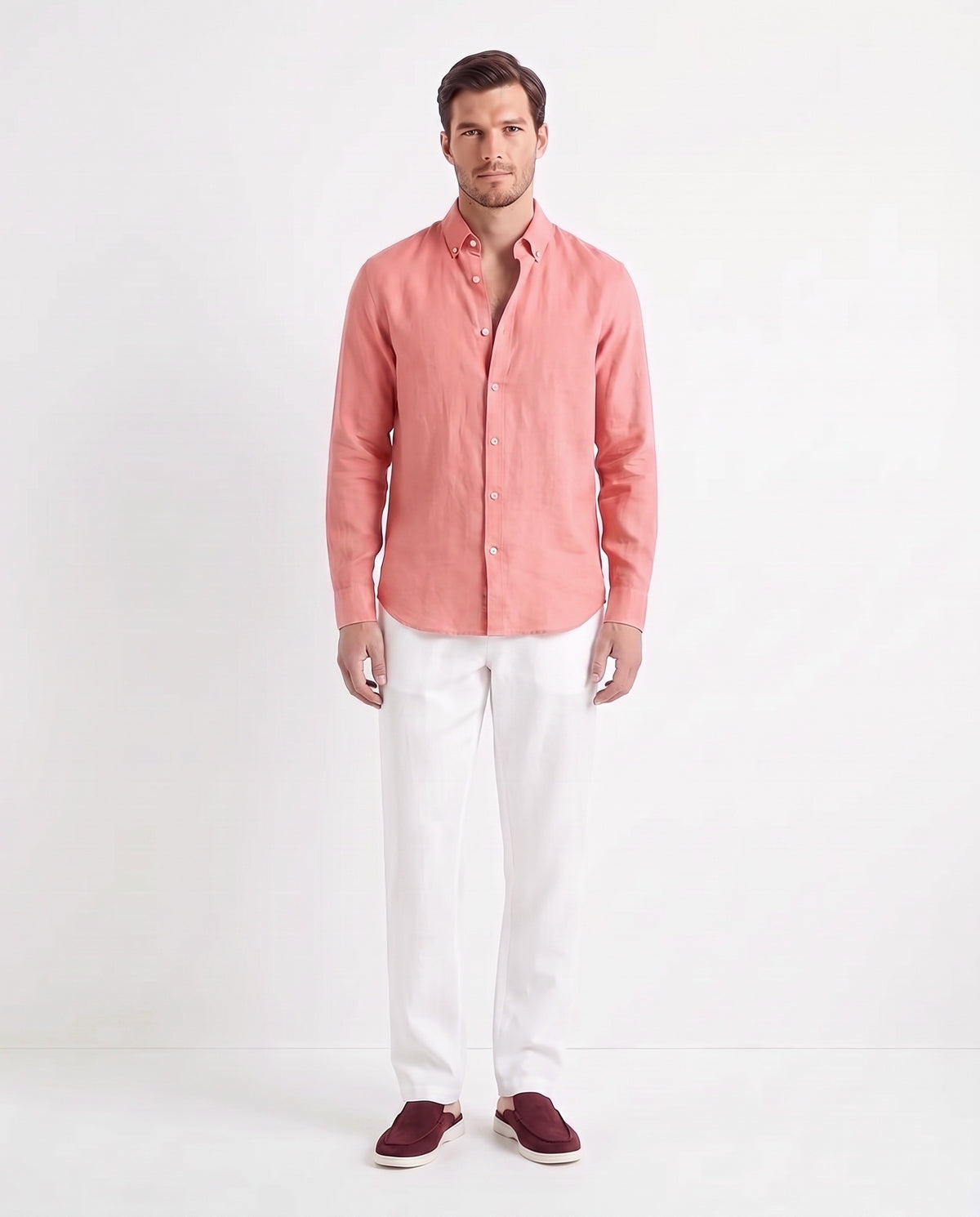 Linen Shirt — Coral Pink worn untucked with the top two buttons open, with Linen Trouser, Drawstring — White and Dune Mule — Burgundy
