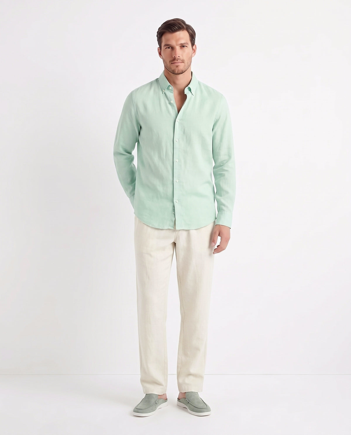 Linen Shirt — Mint worn untucked with the top two buttons open, with Linen Trouser, Button Waist — Cream and Dune Mule — Sage Green