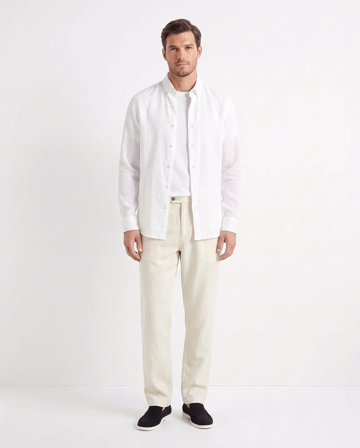 Linen Shirt — White worn open over a white tee, with Linen Trouser, Button Waist — Cream and Terra Loafer — Black Suede, White Sole