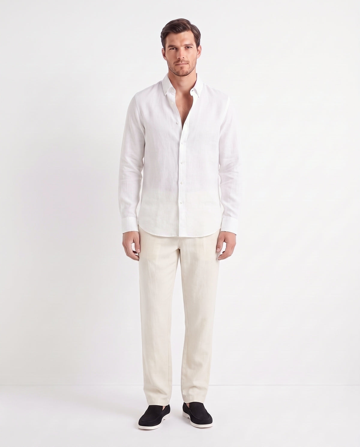 Linen Shirt — White worn untucked with the top two buttons open, with Linen Trouser, Button Waist — Cream and Terra Loafer — Black Suede, White Sole