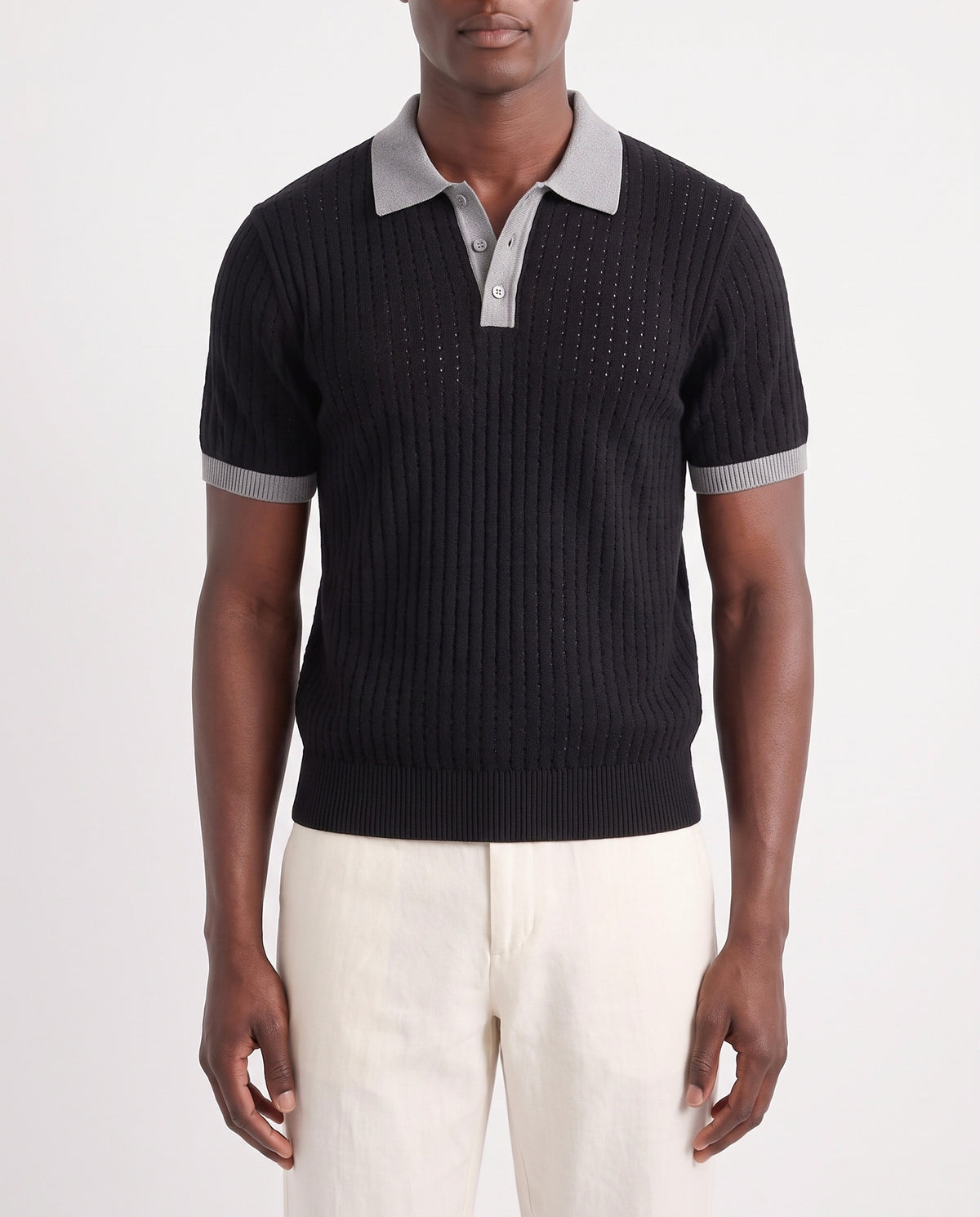Contrast Collar Knit Polo — Black — close-up on the model, worn with Linen Trouser, Button Waist — Cream and Terra Loafer — Black Suede, White Sole