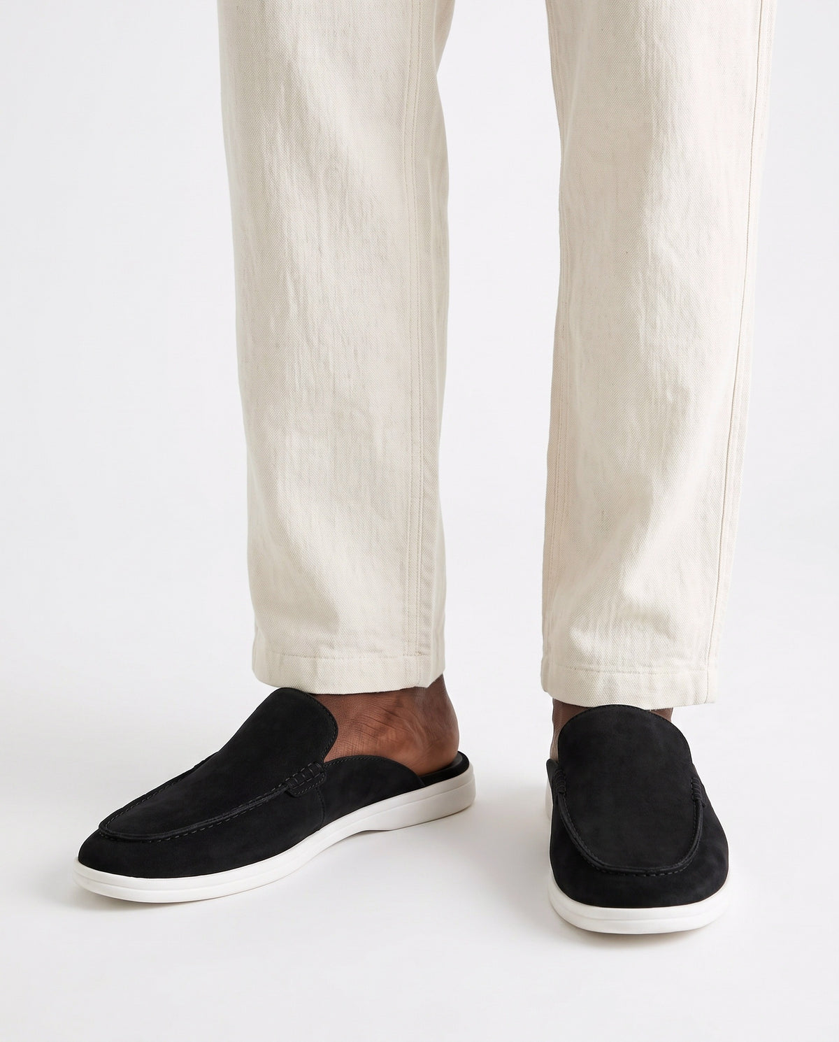 Dune Mule — Black — on foot, close-up, worn with Tipped Knit Polo — Olive and Linen Trouser, Button Waist — Cream