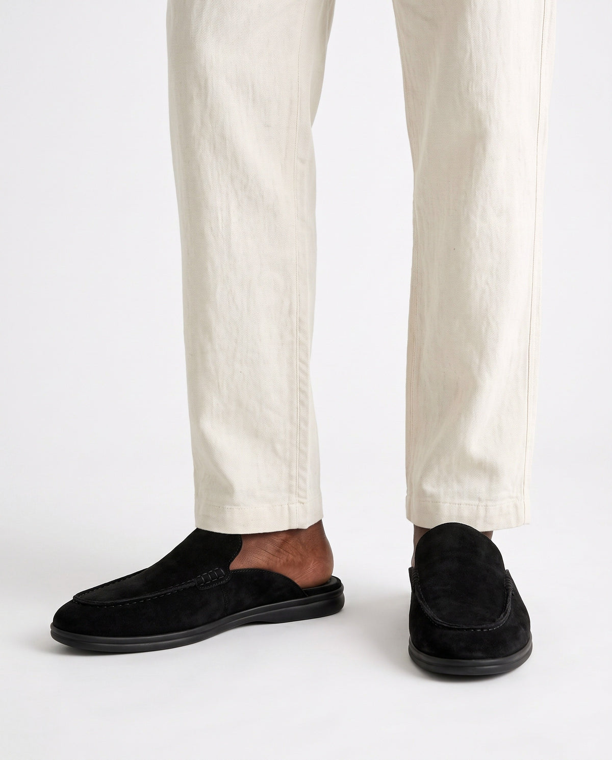 Dune Mule — Black, Black Sole — on foot, close-up, worn with Textured Knit Polo — Black and Linen Trouser, Button Waist — Cream