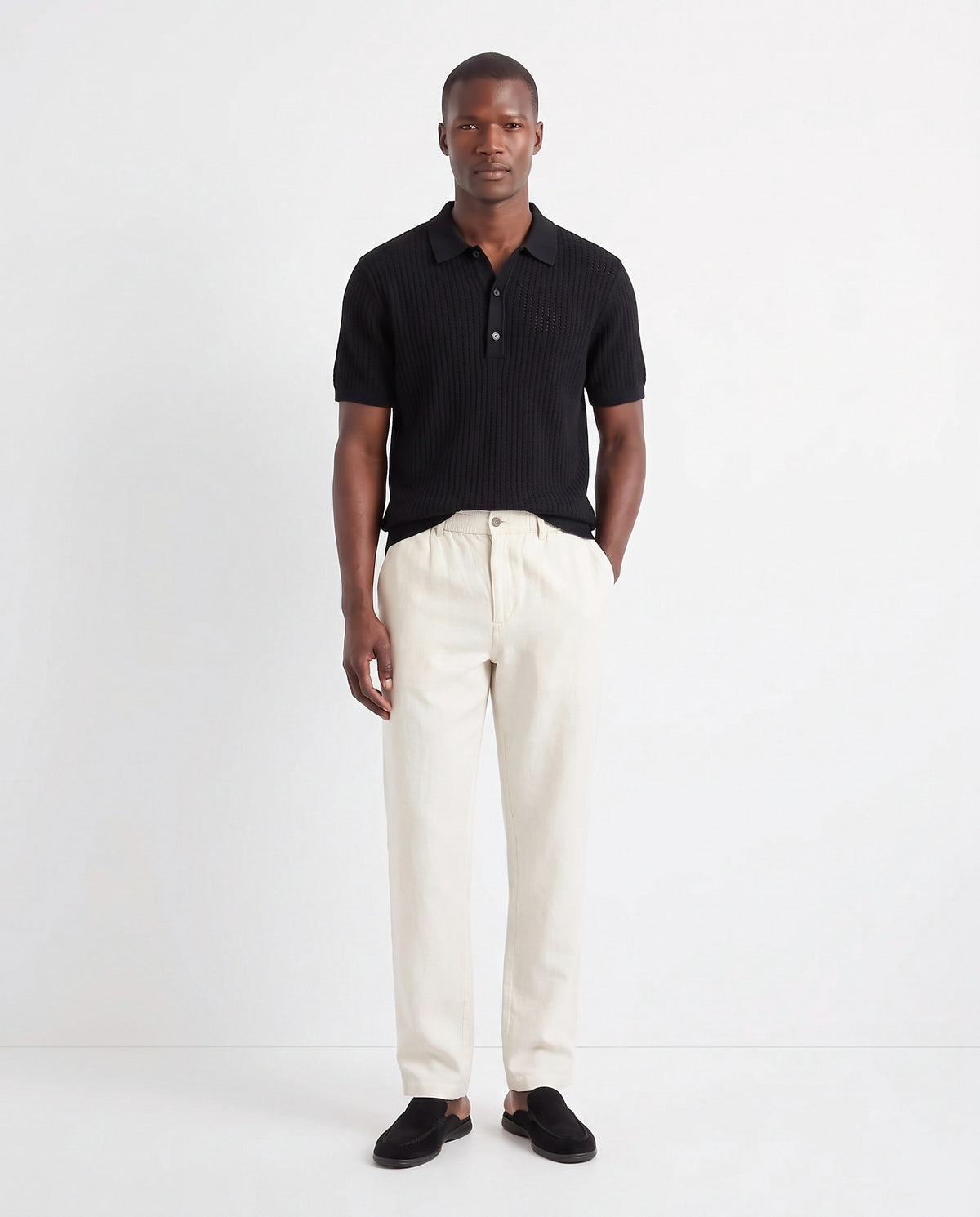 Dune Mule — Black, Black Sole — full look on the model, worn with Textured Knit Polo — Black and Linen Trouser, Button Waist — Cream