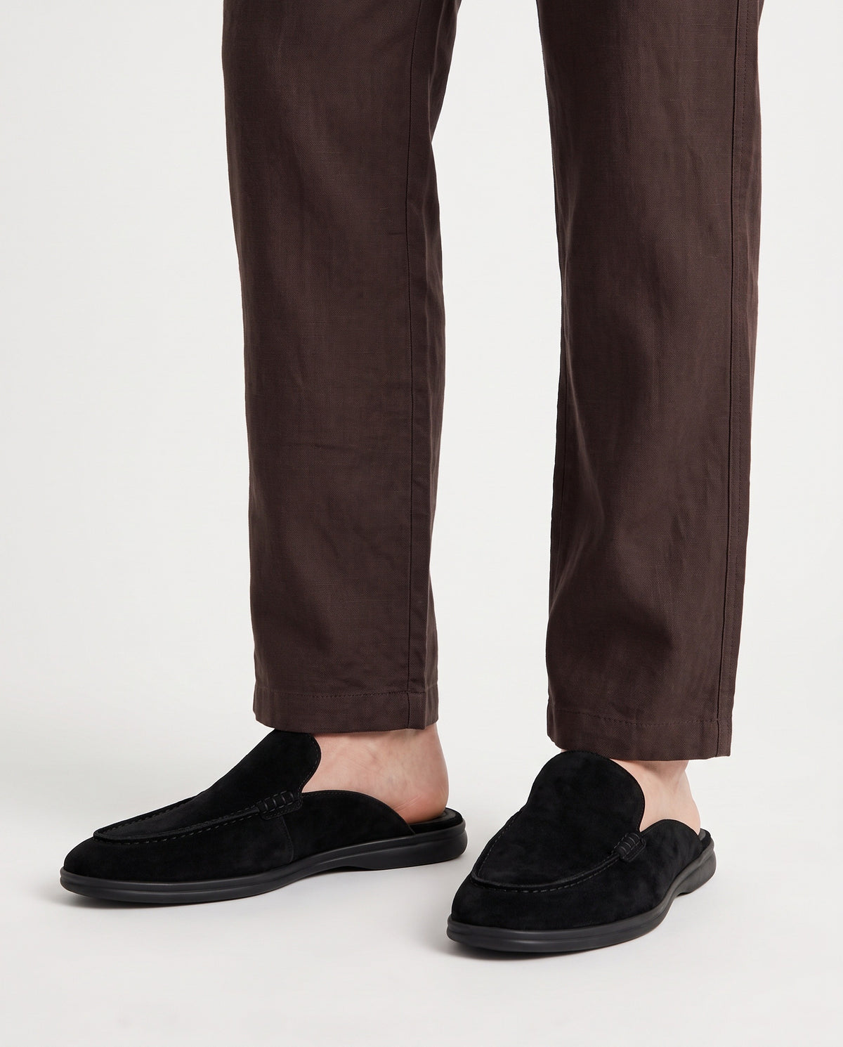 Dune Mule — Black, Black Sole — on foot, close-up, worn with Textured Knit Polo — Cream and Linen Trouser, Button Waist — Dark Brown
