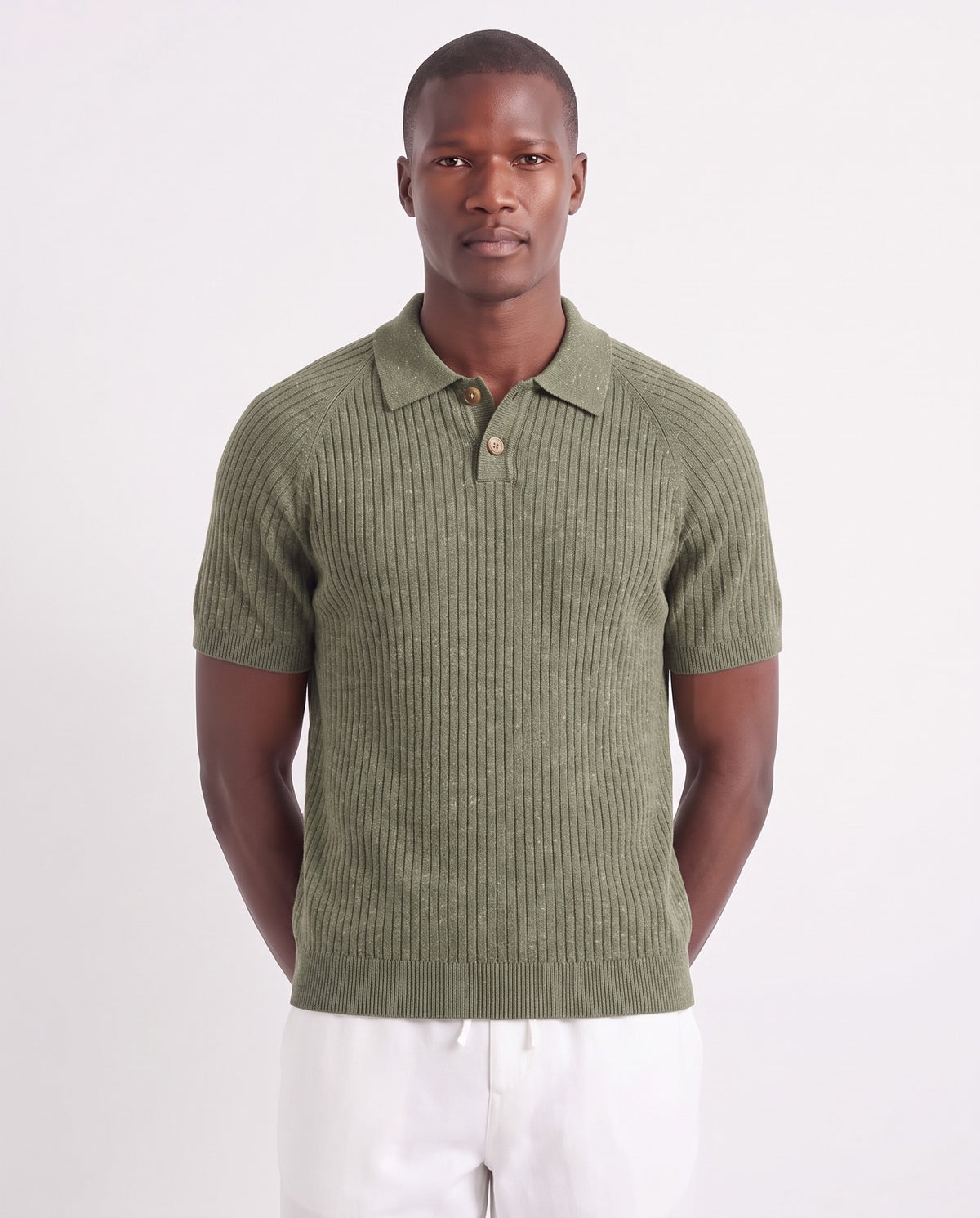Heather Knit Polo — Green — close-up on the model, worn with Linen Trouser, Drawstring — White and Dune Mule — Sage Green