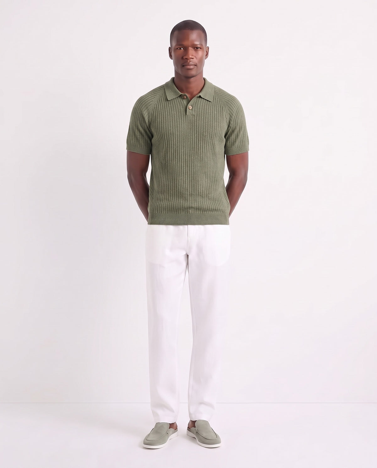 Heather Knit Polo — Green — full look on the model, worn with Linen Trouser, Drawstring — White and Dune Mule — Sage Green