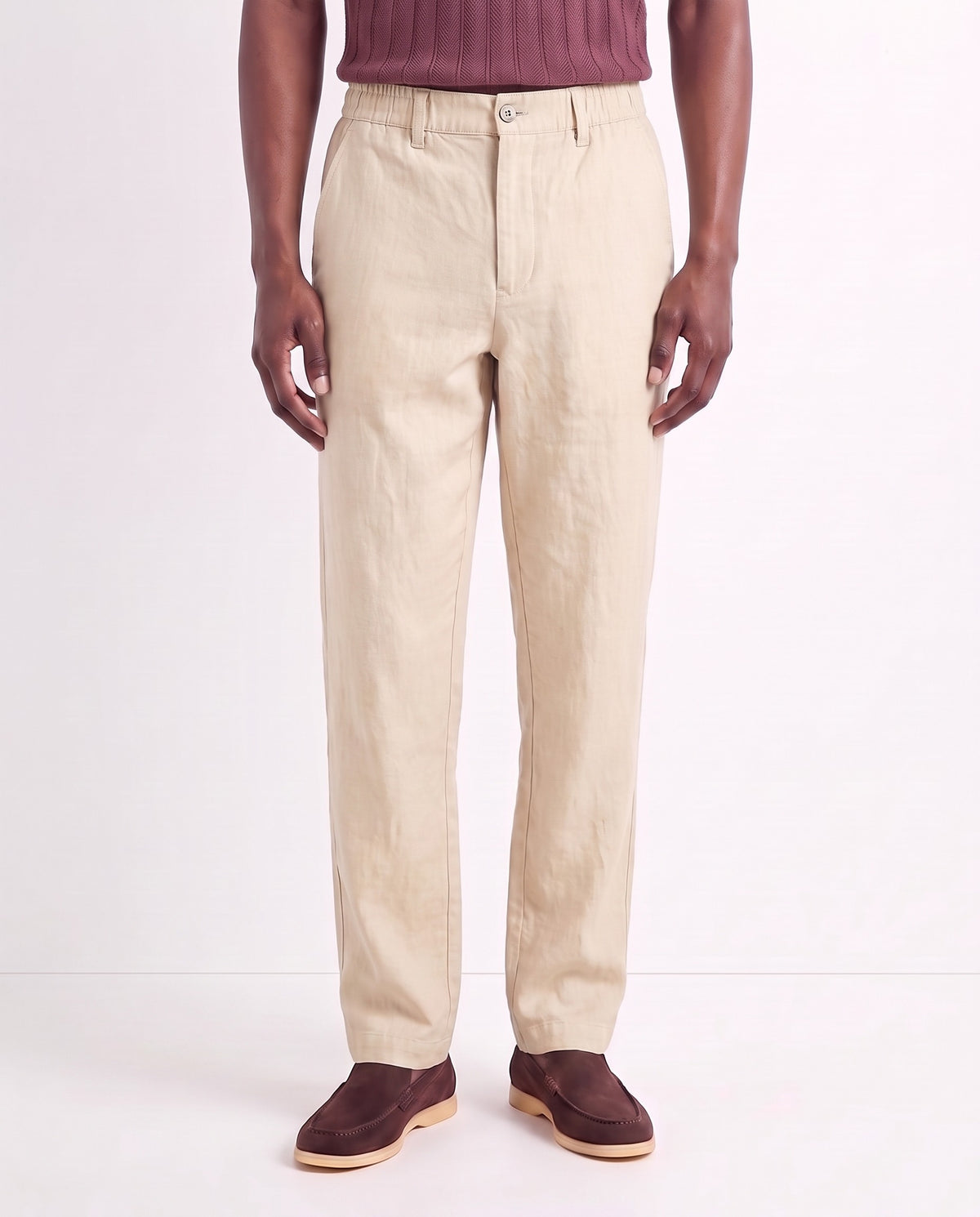 Linen Trouser, Button Waist — Dark Cream — close-up on the model, worn with Tipped Knit Polo — Burgundy and Terra Loafer — Dark Brown, Beige Sole