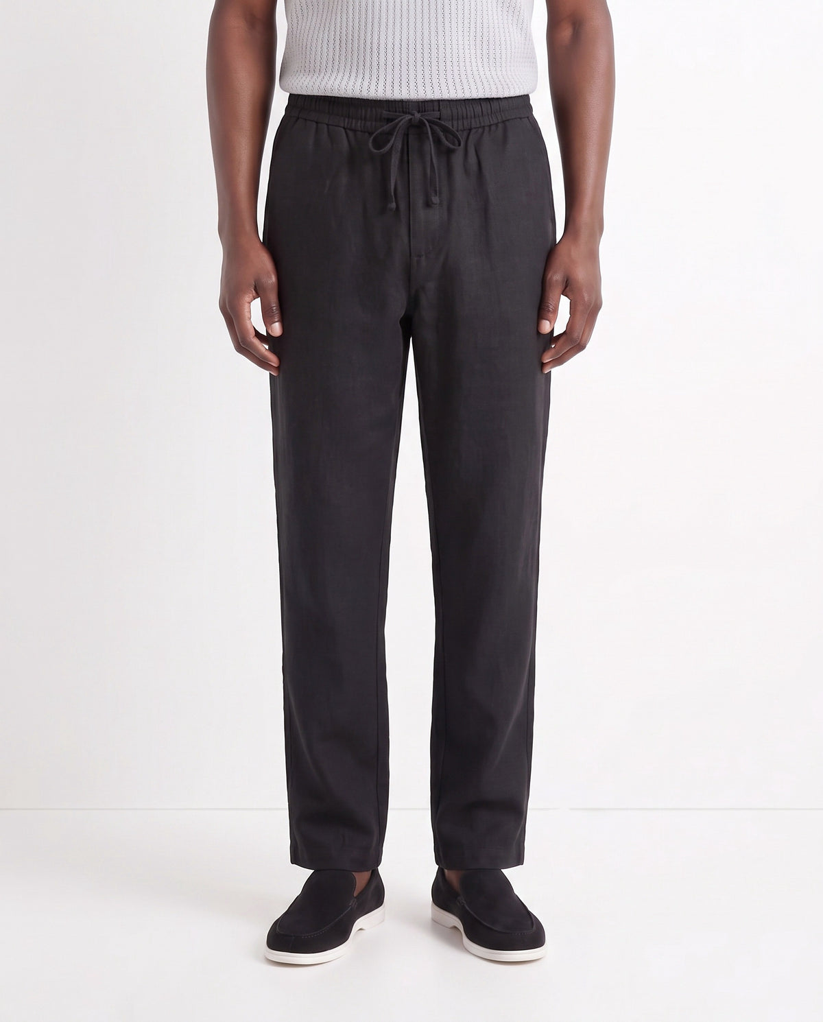 Linen Trouser, Drawstring — Black — close-up on the model, worn with Textured Knit Polo — Light Grey and Terra Loafer — Black Suede, White Sole