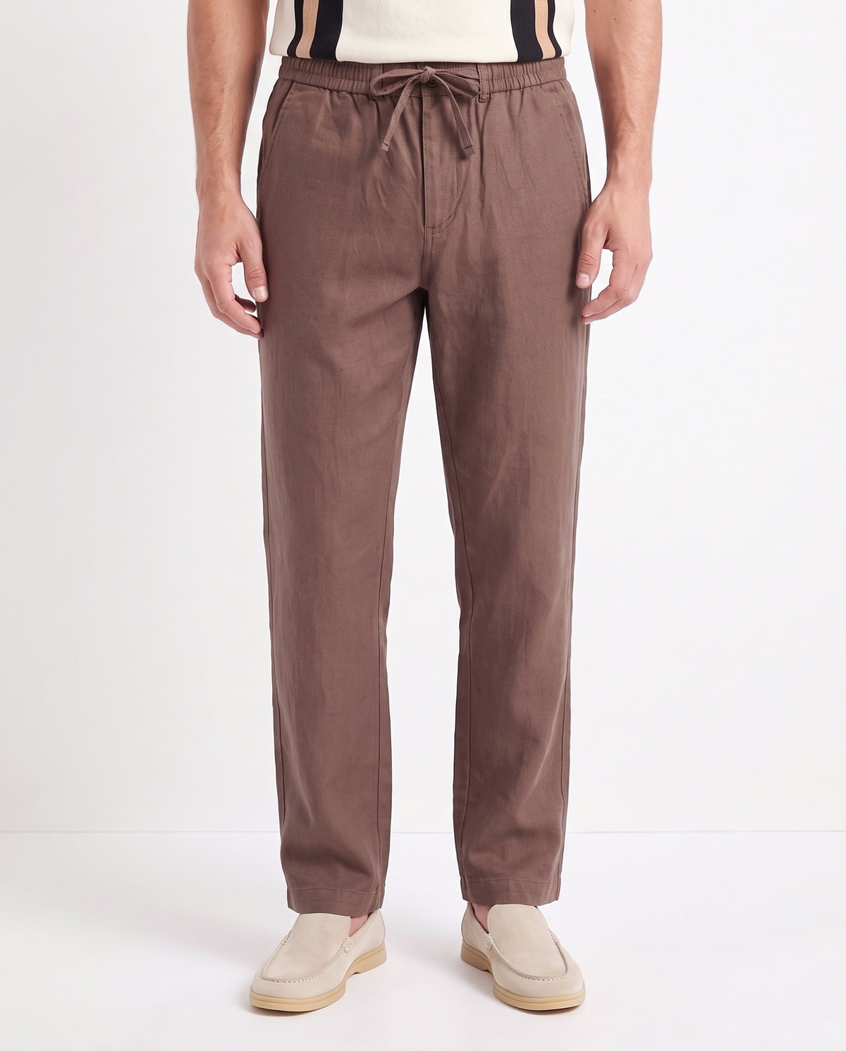 Linen Trouser, Drawstring — Brown — close-up on the model, worn with Retro Stripe Knit Polo — Cream and Terra Loafer — Cream, Beige Sole