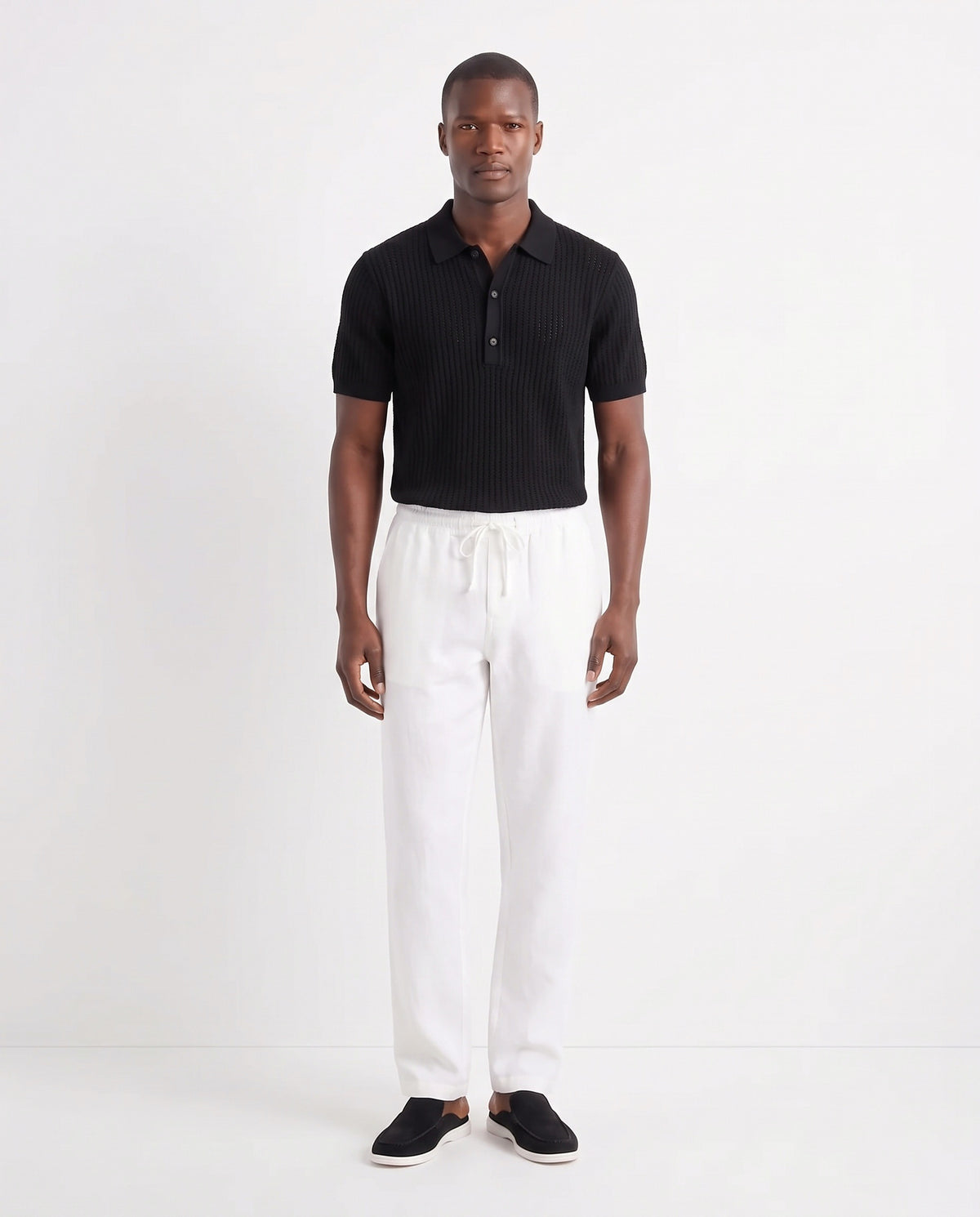 Linen Trouser, Drawstring — White — full look on the model, worn with Textured Knit Polo — Black and Dune Mule — Black