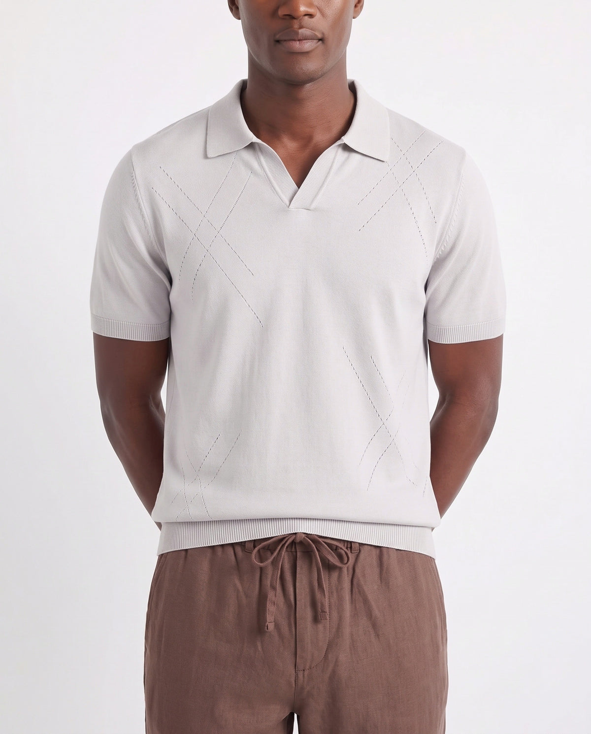 Open-Collar Knit Polo — Pale Grey — close-up on the model, worn with Linen Trouser, Drawstring — Brown and Terra Loafer — Tobacco, Light Grey Sole