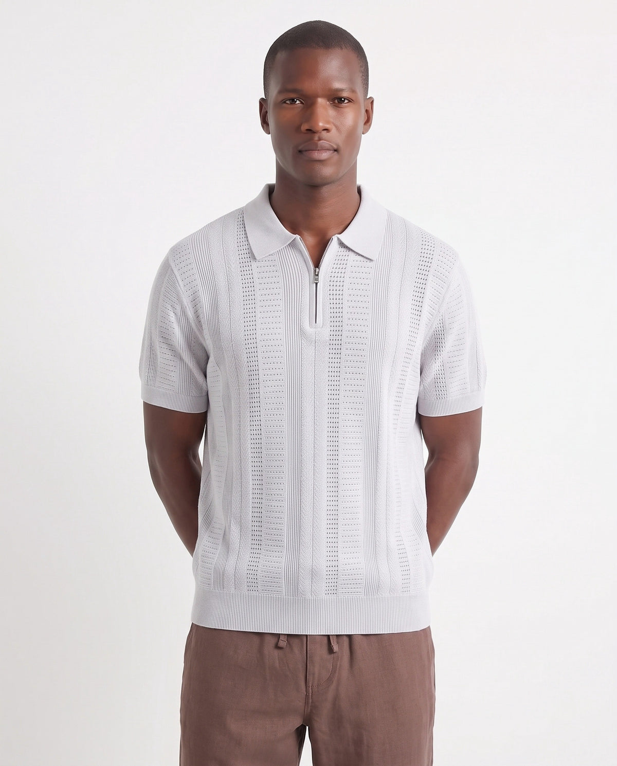Quarter-Zip Knit Polo — Light Grey — close-up on the model, worn with Linen Trouser, Drawstring — Brown and Terra Loafer — Black Suede, Black Sole
