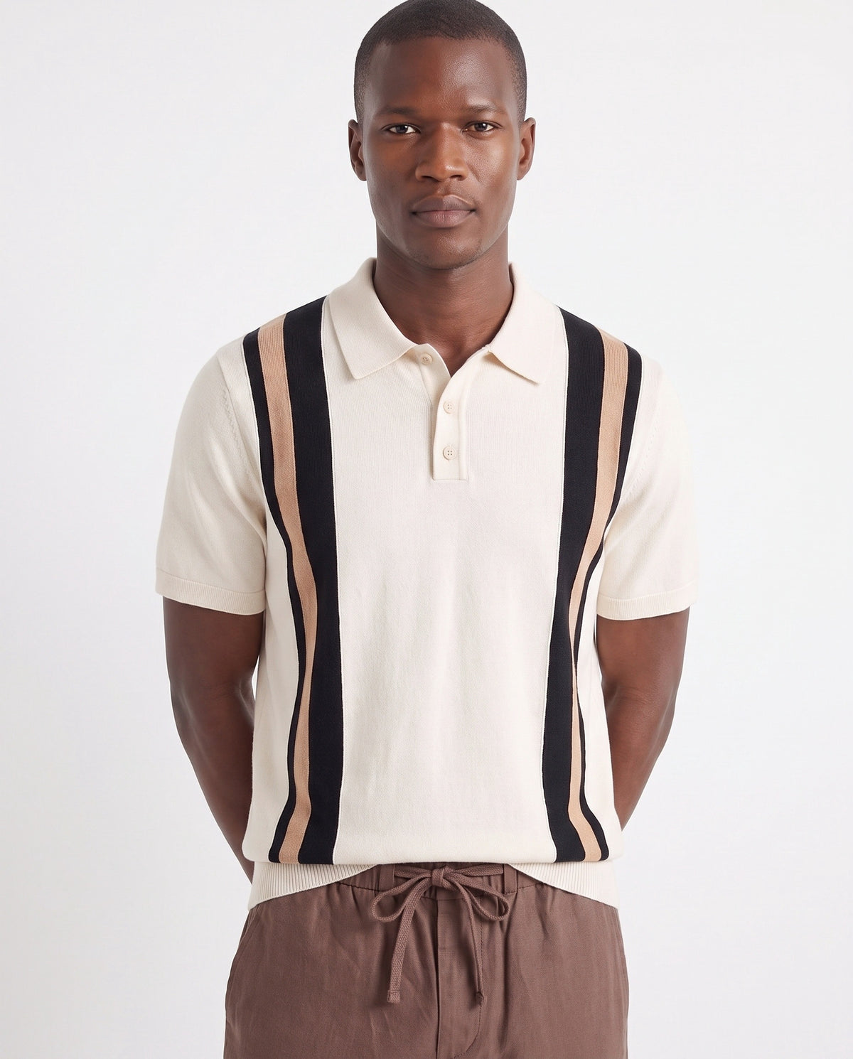 Retro Stripe Knit Polo — Cream — close-up on the model, worn with Linen Trouser, Drawstring — Brown and Dune Mule — Cream
