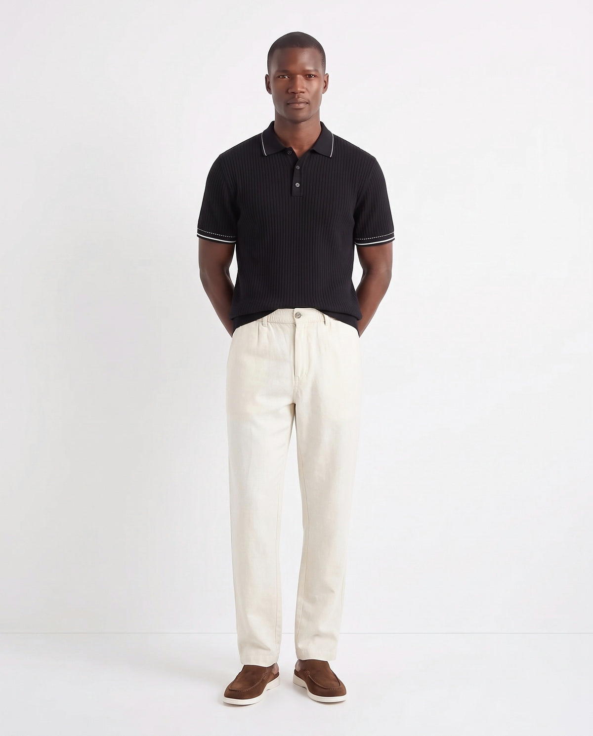Stitch-Trim Ribbed Polo — Black — full look on the model, worn with Linen Trouser, Button Waist — Cream and Dune Mule — Cocoa