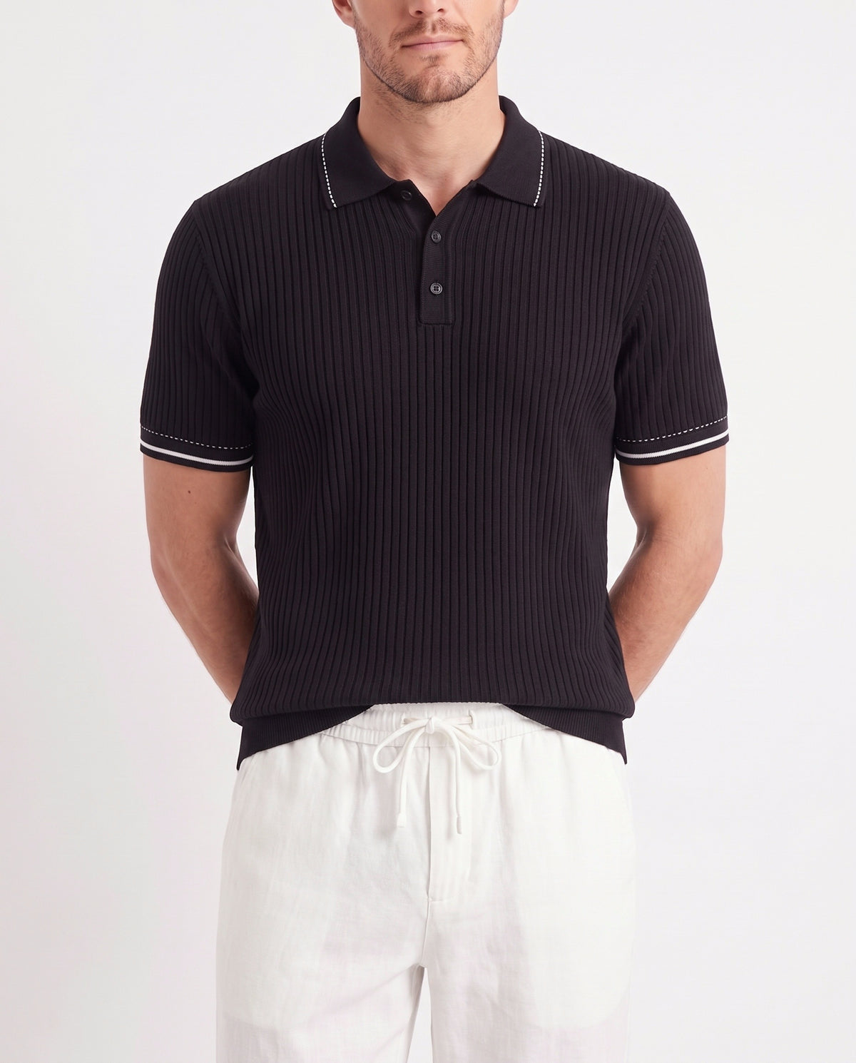 Stitch-Trim Ribbed Polo — Black — close-up on the model, worn with Linen Trouser, Drawstring — White and Terra Loafer — Navy Suede, Beige Sole