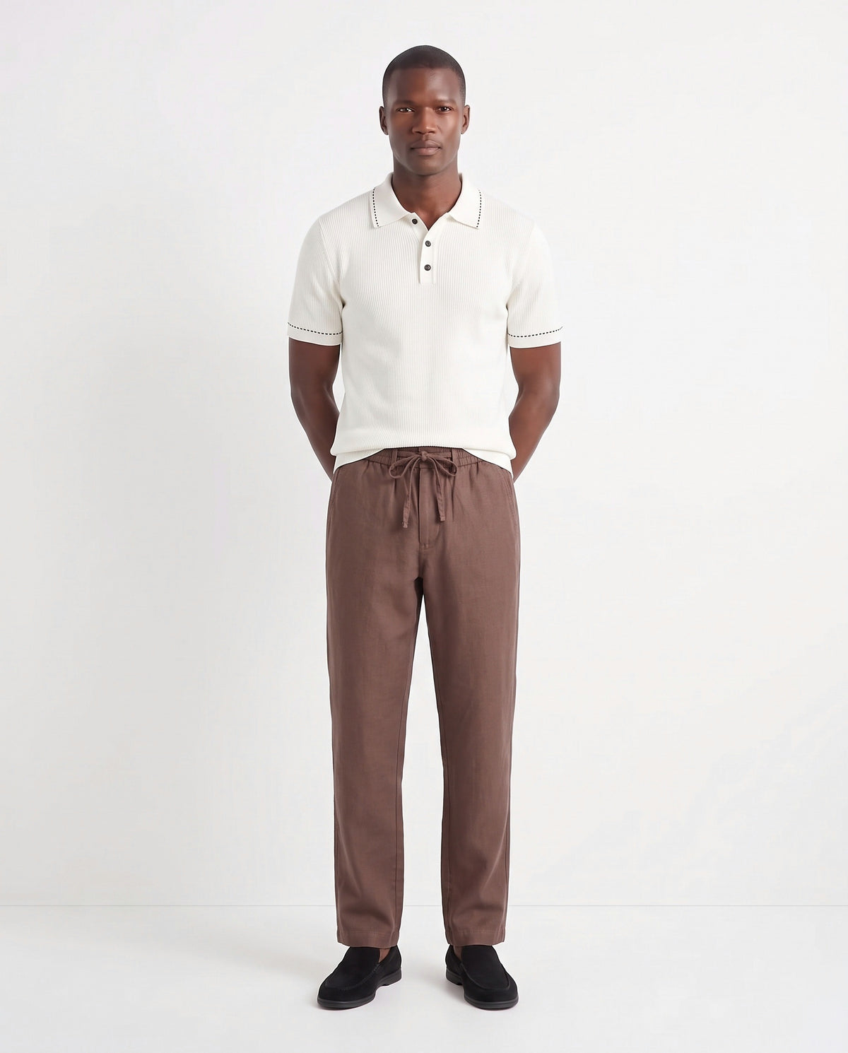 Stitch-Trim Ribbed Polo — White — full look on the model, worn with Linen Trouser, Drawstring — Brown and Terra Loafer — Black Suede, Black Sole