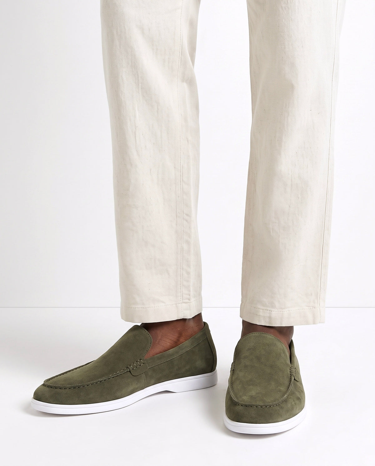 Terra Loafer — Olive Suede, White Sole — on foot, close-up, worn with Tipped Knit Polo — Olive and Linen Trouser, Button Waist — Cream