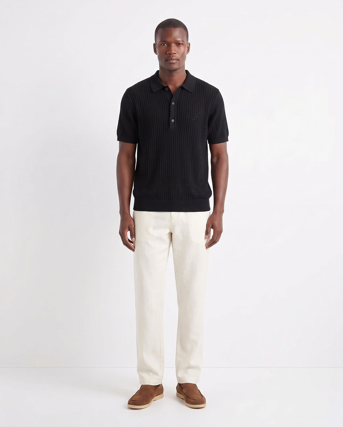 Textured Knit Polo — Black — full look on the model, worn with Linen Trouser, Button Waist — Cream and Terra Loafer — Tobacco, Beige Sole