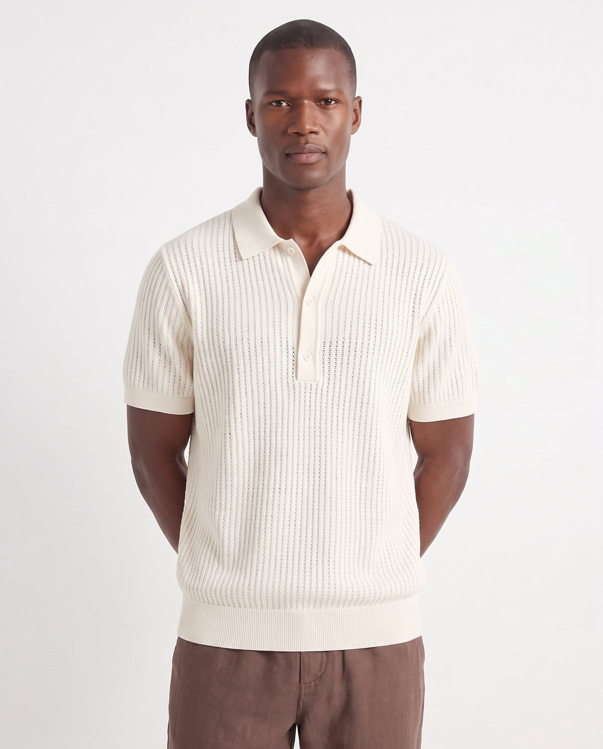 Textured Knit Polo — Cream — close-up on the model, worn with Linen Trouser, Drawstring — Brown and Terra Loafer — Stone Grey, Beige Sole
