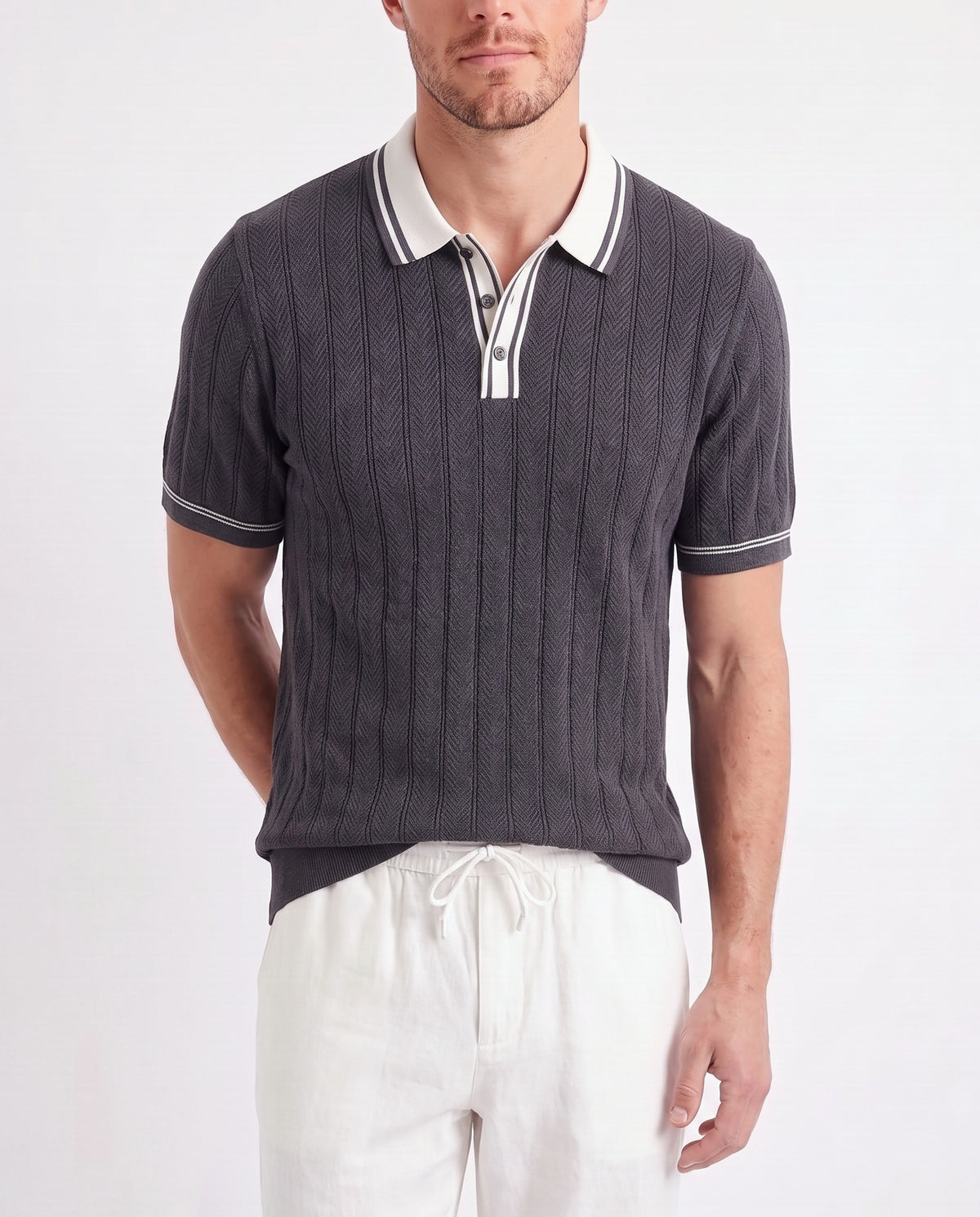 Tipped Knit Polo — Charcoal — close-up on the model, worn with Linen Trouser, Drawstring — White and Dune Mule — Dusk Blue