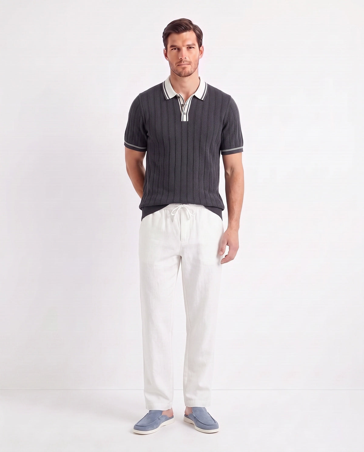 Tipped Knit Polo — Charcoal — full look on the model, worn with Linen Trouser, Drawstring — White and Dune Mule — Dusk Blue