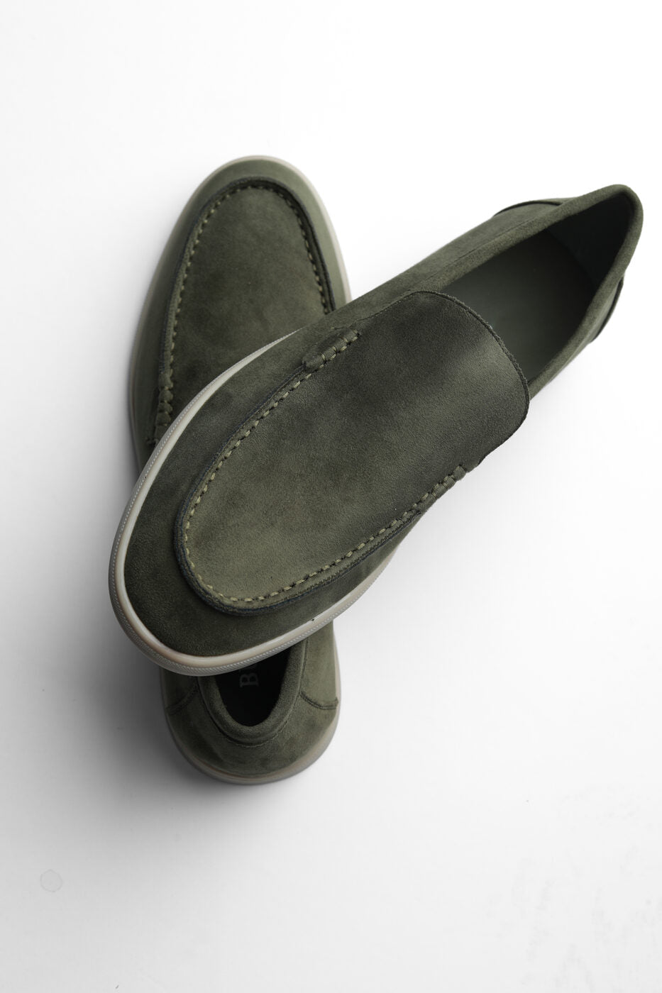 Belugga Terra Loafer in olive suede, angled view showing the sole