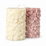 Floral Pillar Candles – ivory and dusty mauve flower-relief pillar candles, side view
